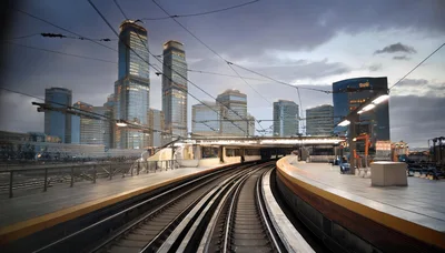 Subway Train Tracks Approaching Modern City Skyscrapers