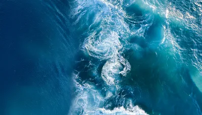 Aerial View Of Turbulent Ocean Waves And Currents