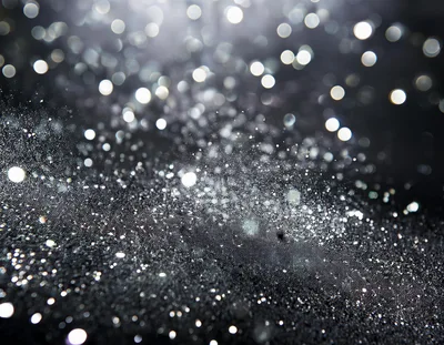 Abstract Silver Glitter Texture With Bokeh Light Effects