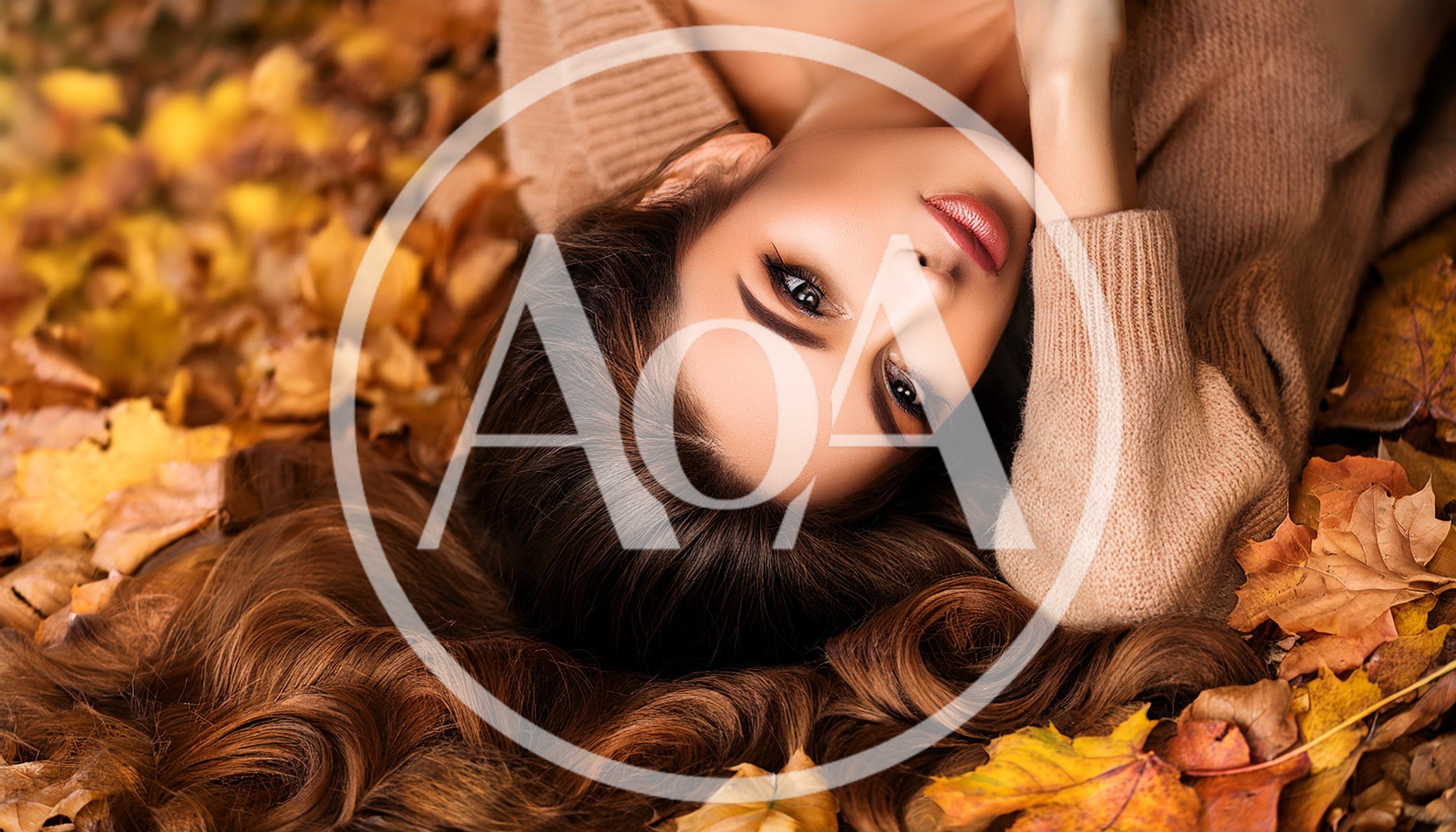 Beautiful Woman Lying In Autumn Leaves