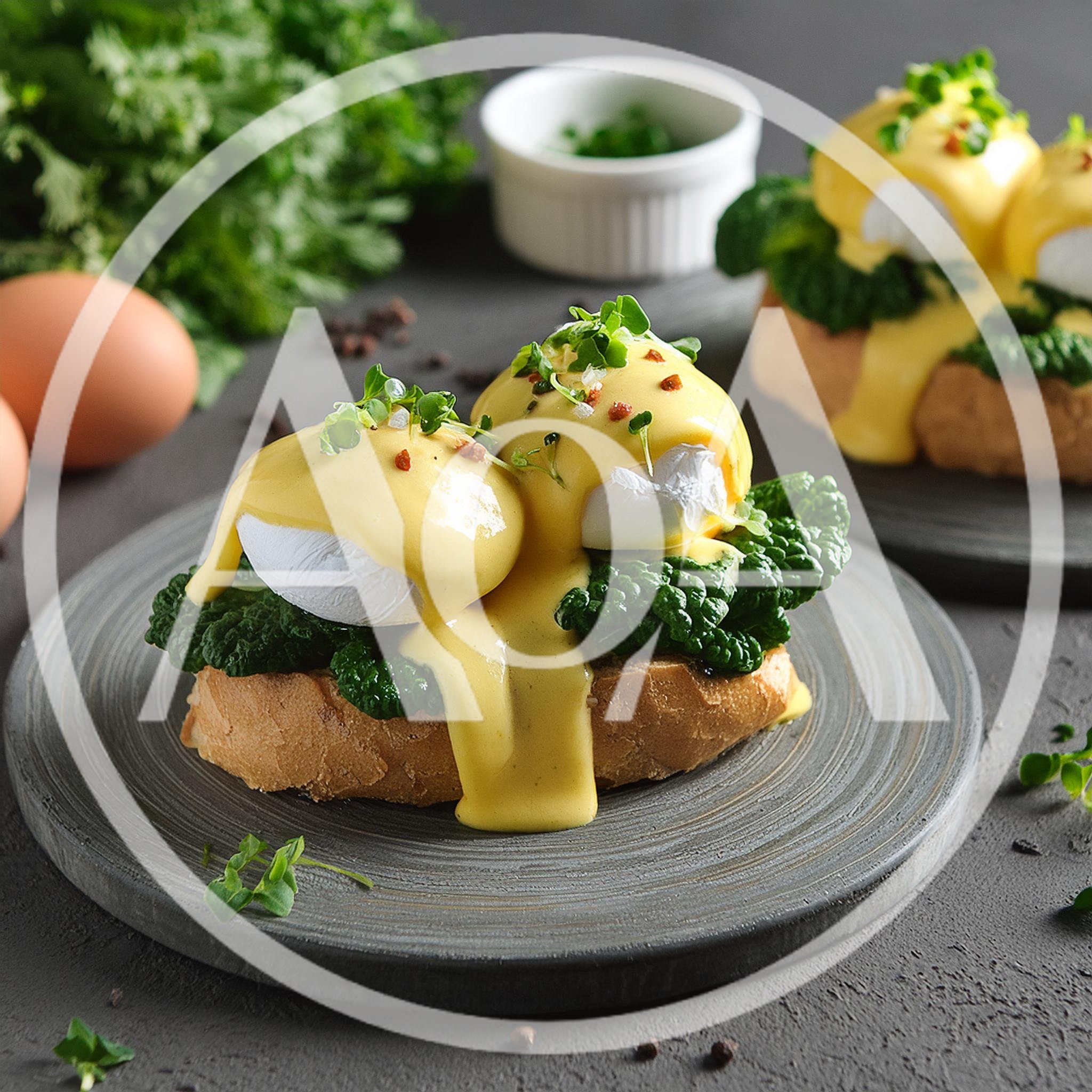Gourmet Eggs Benedict With Kale On Toasted Bread