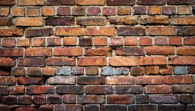 Weathered Red Brick Wall Texture Background