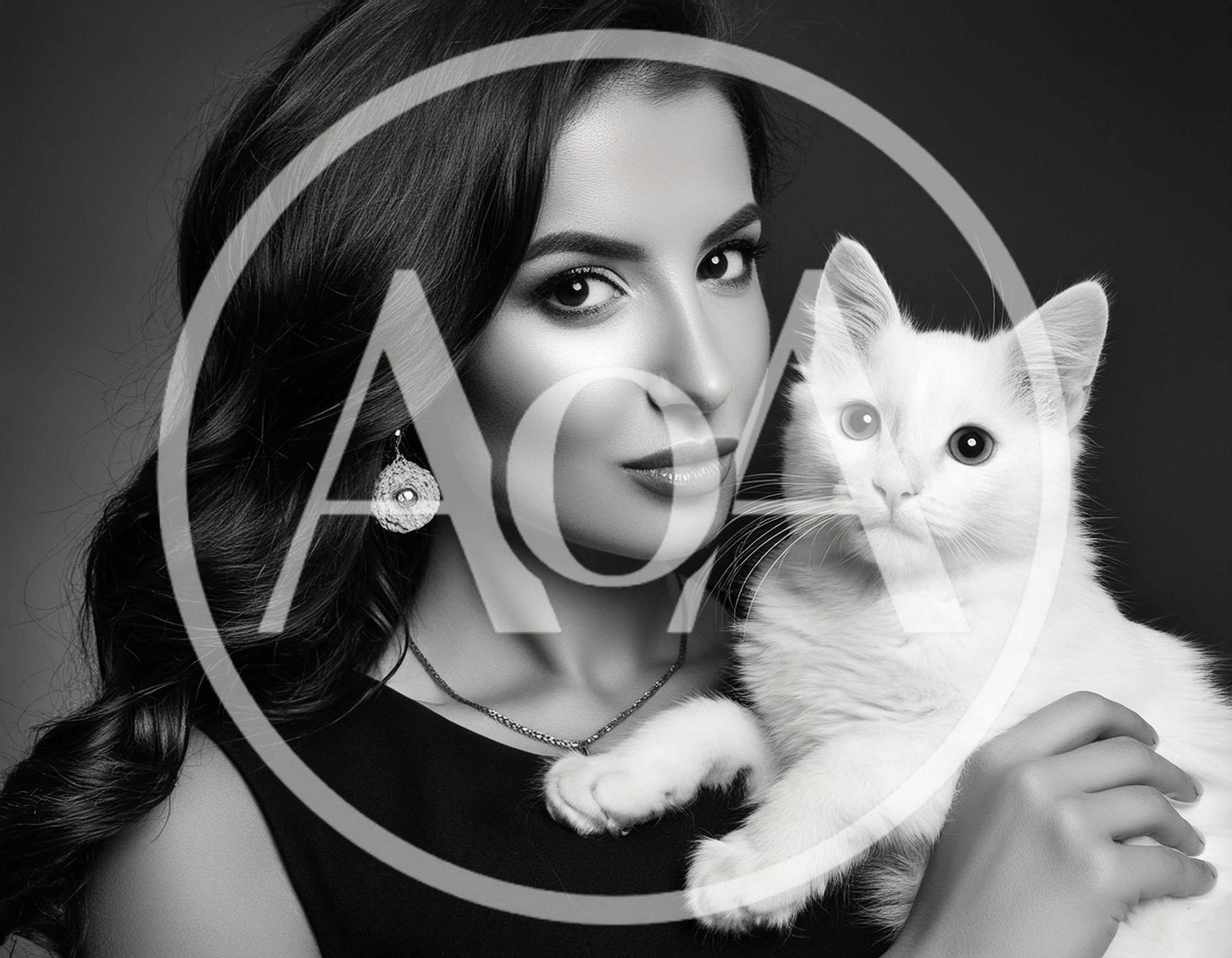 Elegant Woman Holding A Fluffy White Cat
