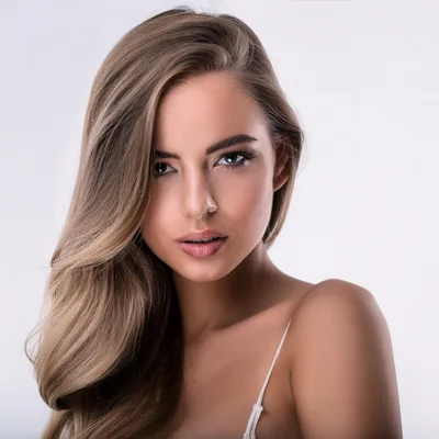 Portrait Of A Beautiful Young Woman With Long Blonde Hair