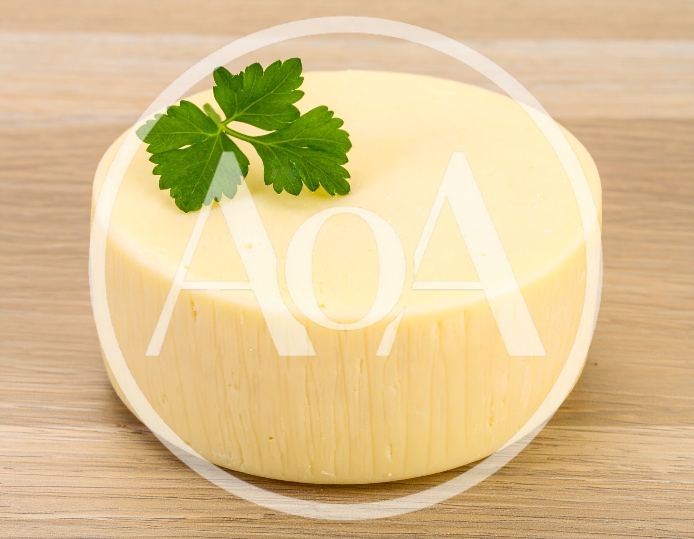 Round Wheel Of Fresh Yellow Cheese With Parsley