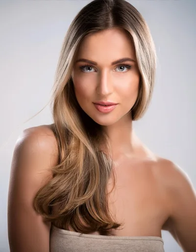 Portrait Of A Beautiful Young Woman With Blonde Hair