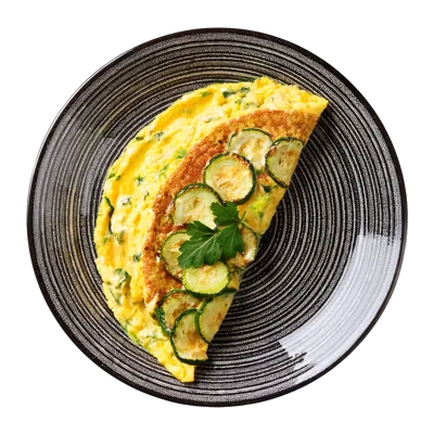 Zucchini Omelet Served On A Decorative Plate