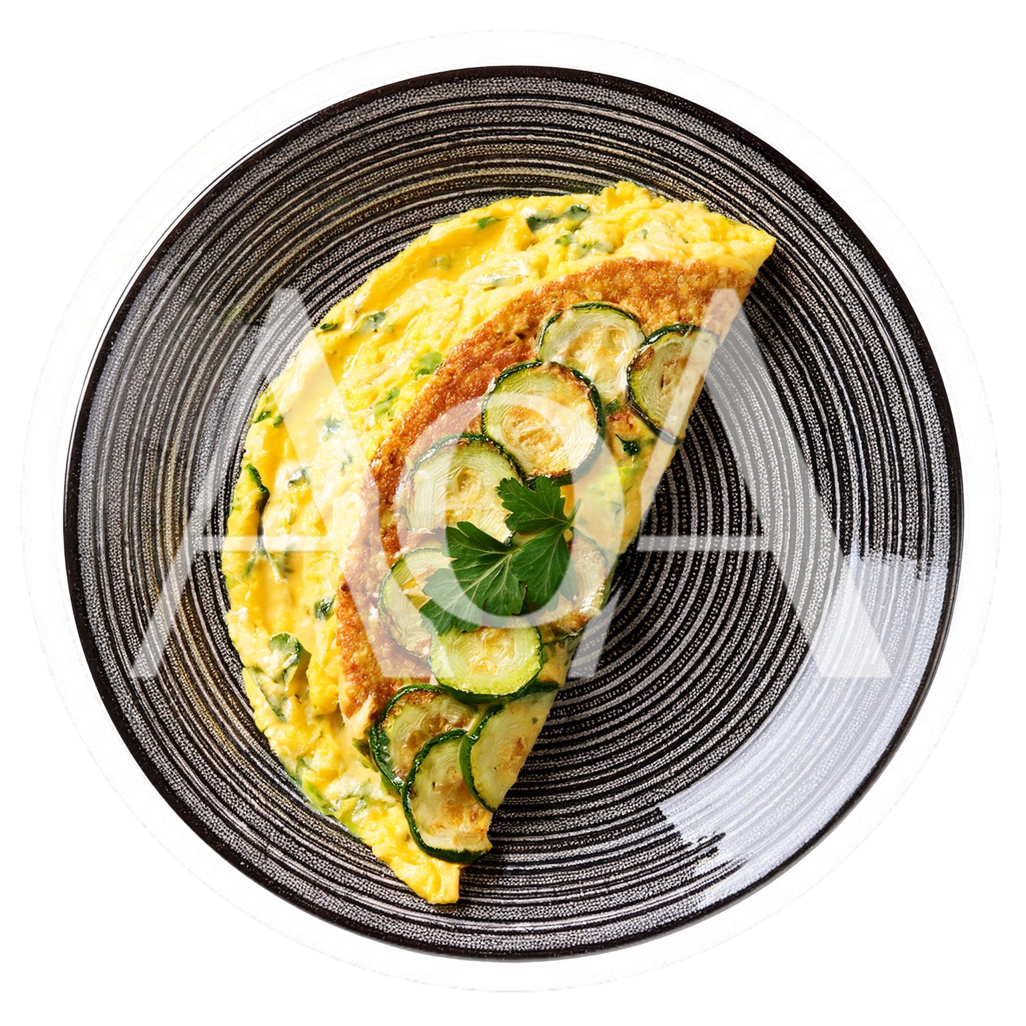 Zucchini Omelet Served On A Decorative Plate