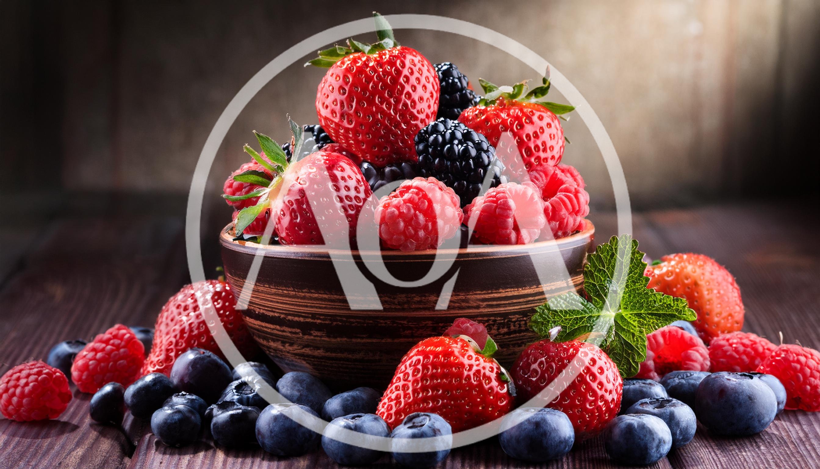 Fresh Mixed Berries In A Rustic Ceramic Bowl