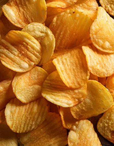 Top Down View Of Crispy Ridged Potato Chips