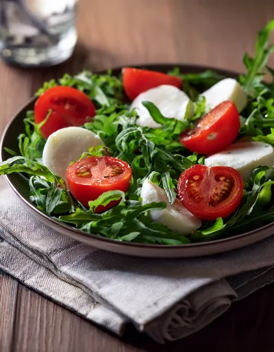 Fresh Caprese Salad With Arugula And Mozzarella