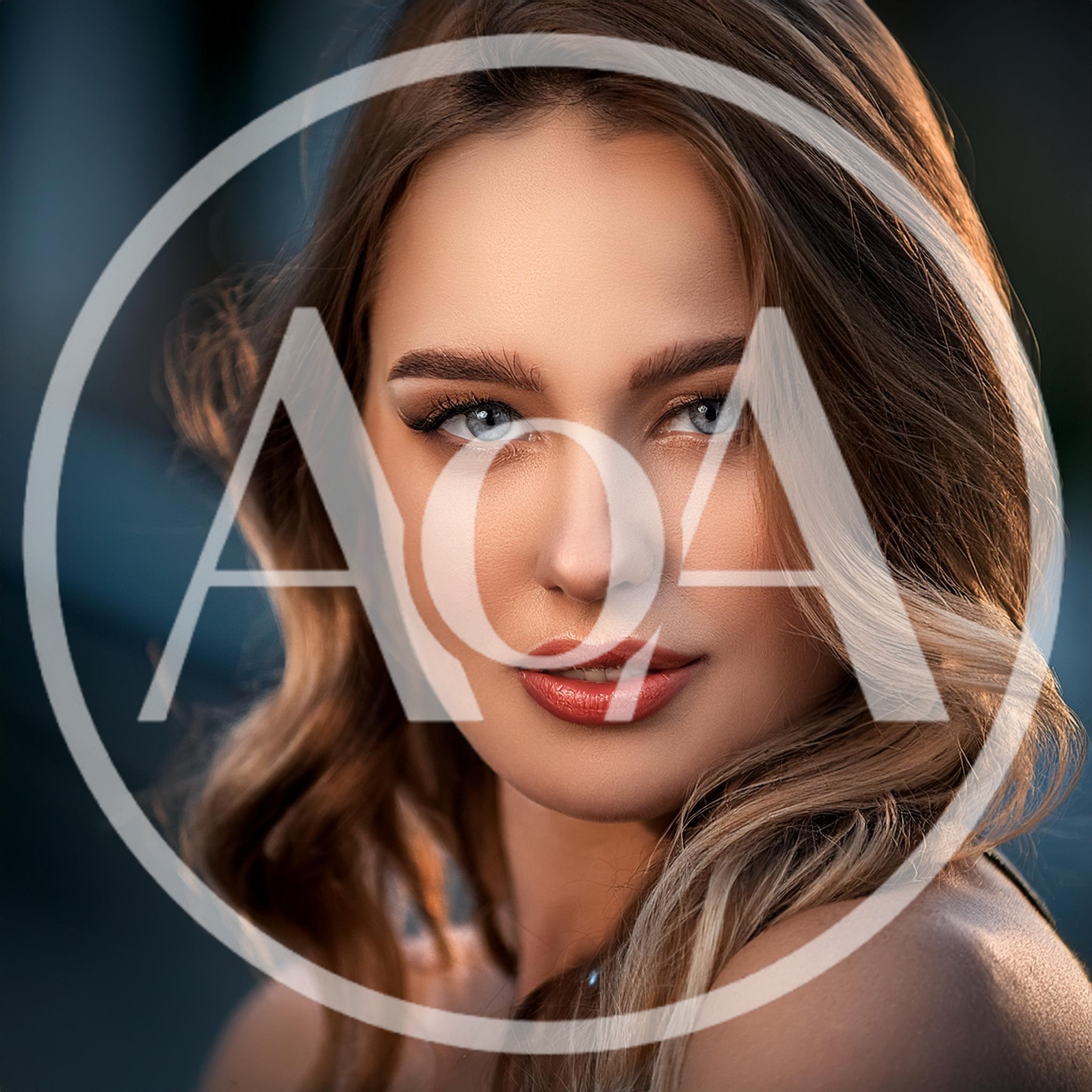 Portrait Of A Beautiful Young Woman With Blue Eyes