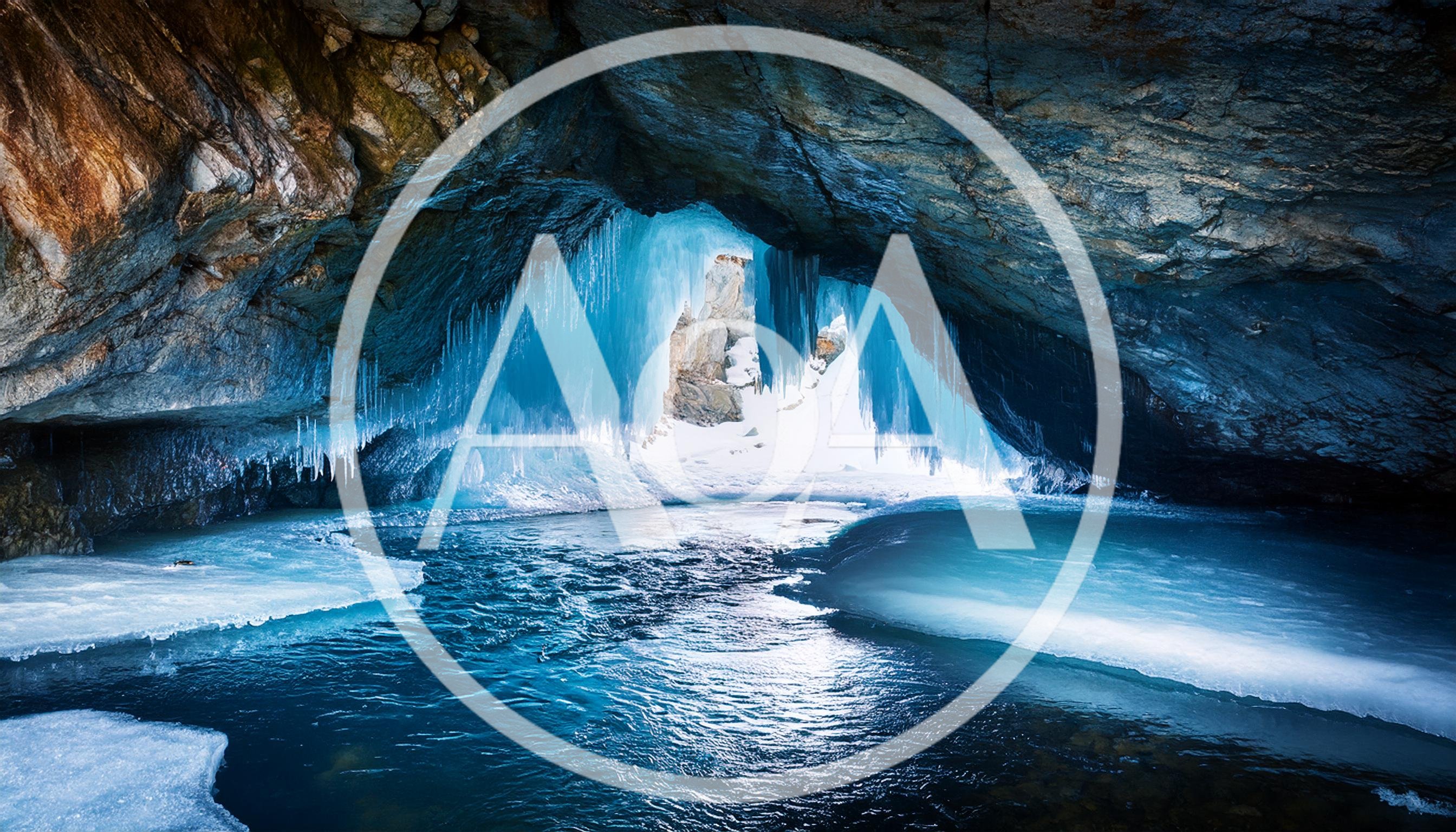 Frozen Ice Cave With Blue Icicles And Water