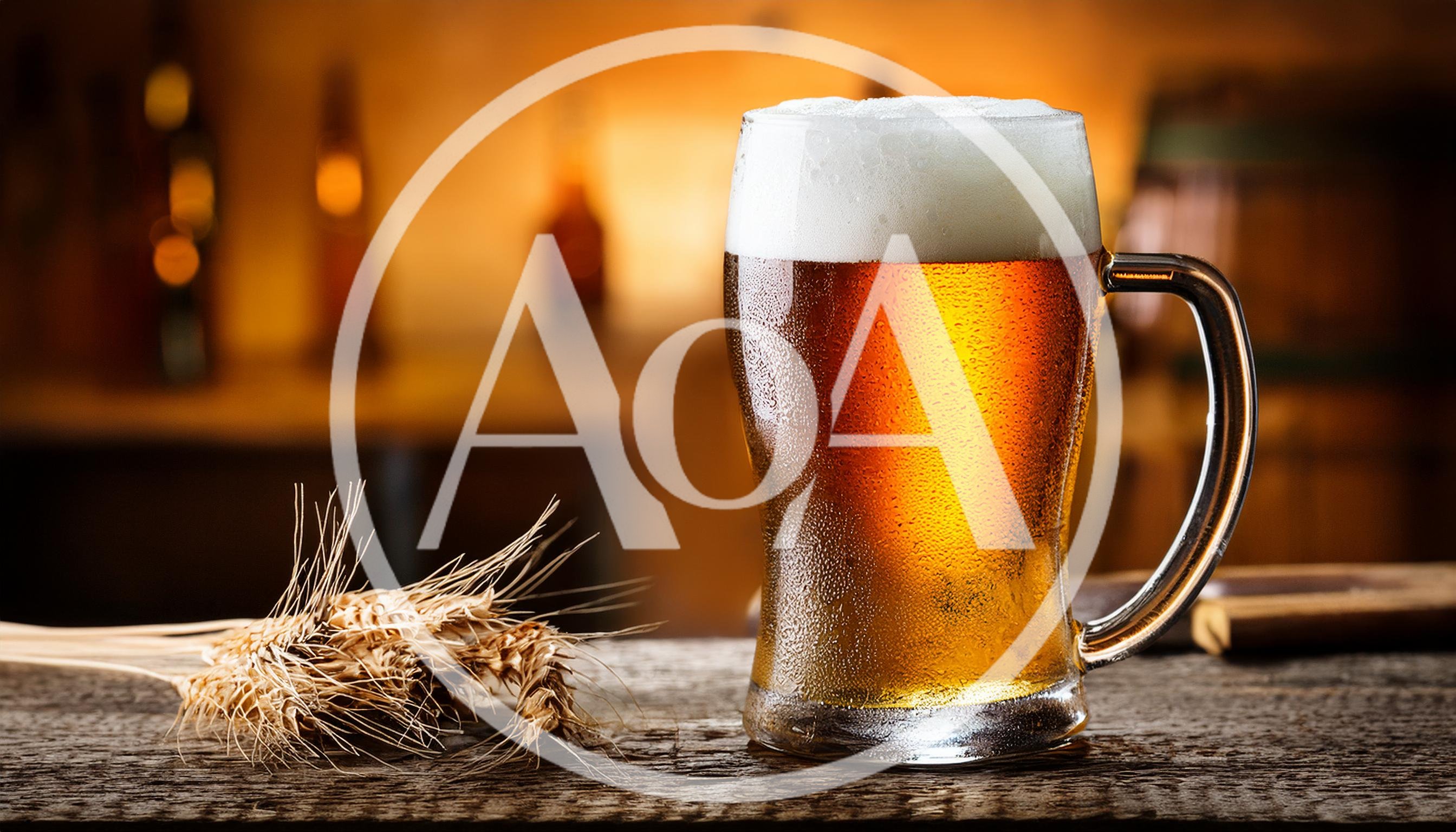Cold Glass Of Beer With Wheat Stalks