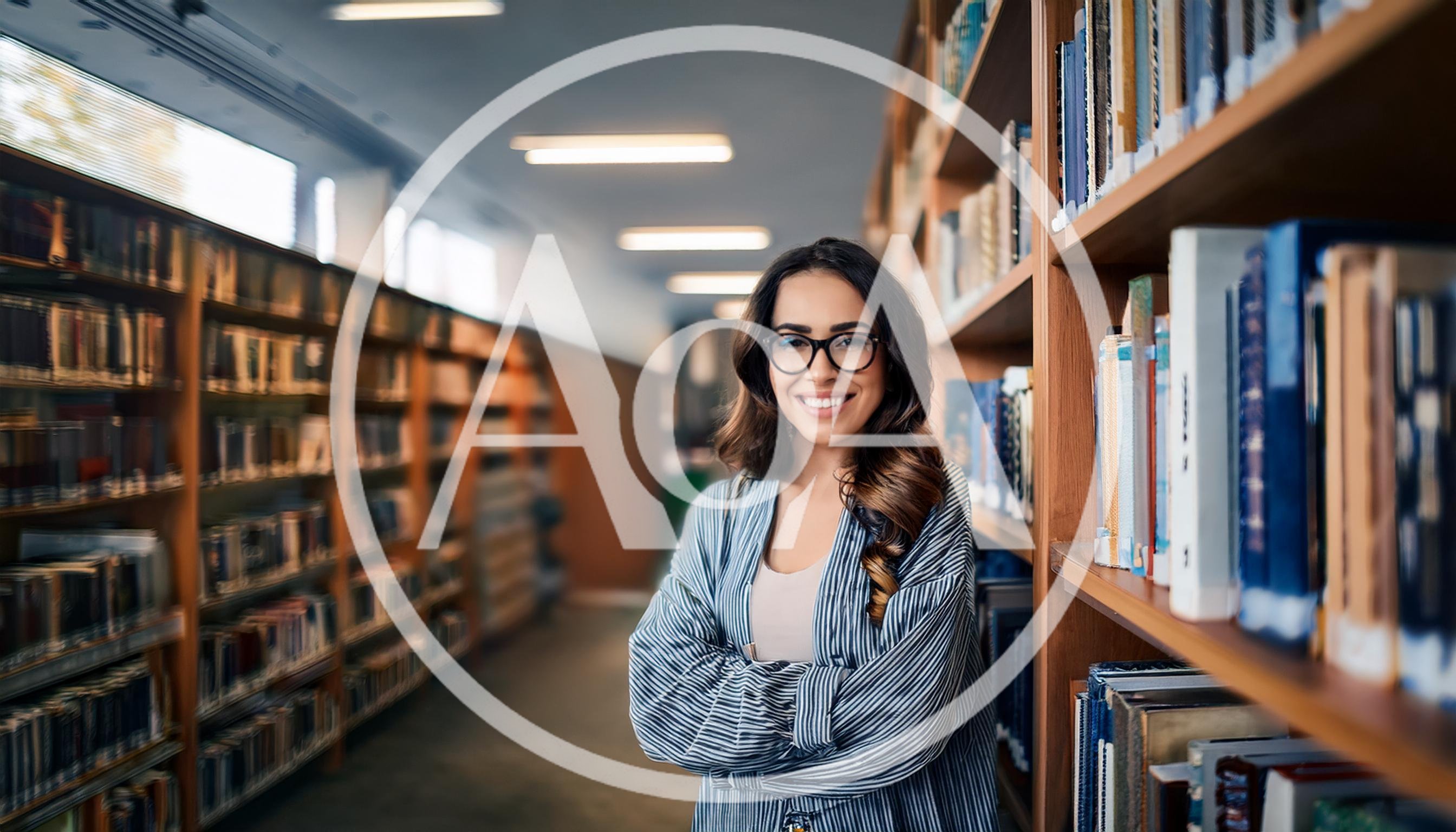 Smiling Young Woman Standing In A Library