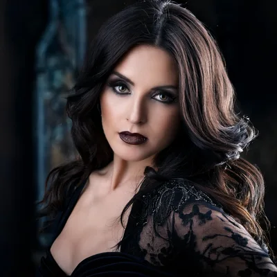 Portrait Of A Beautiful Woman With Dark Makeup