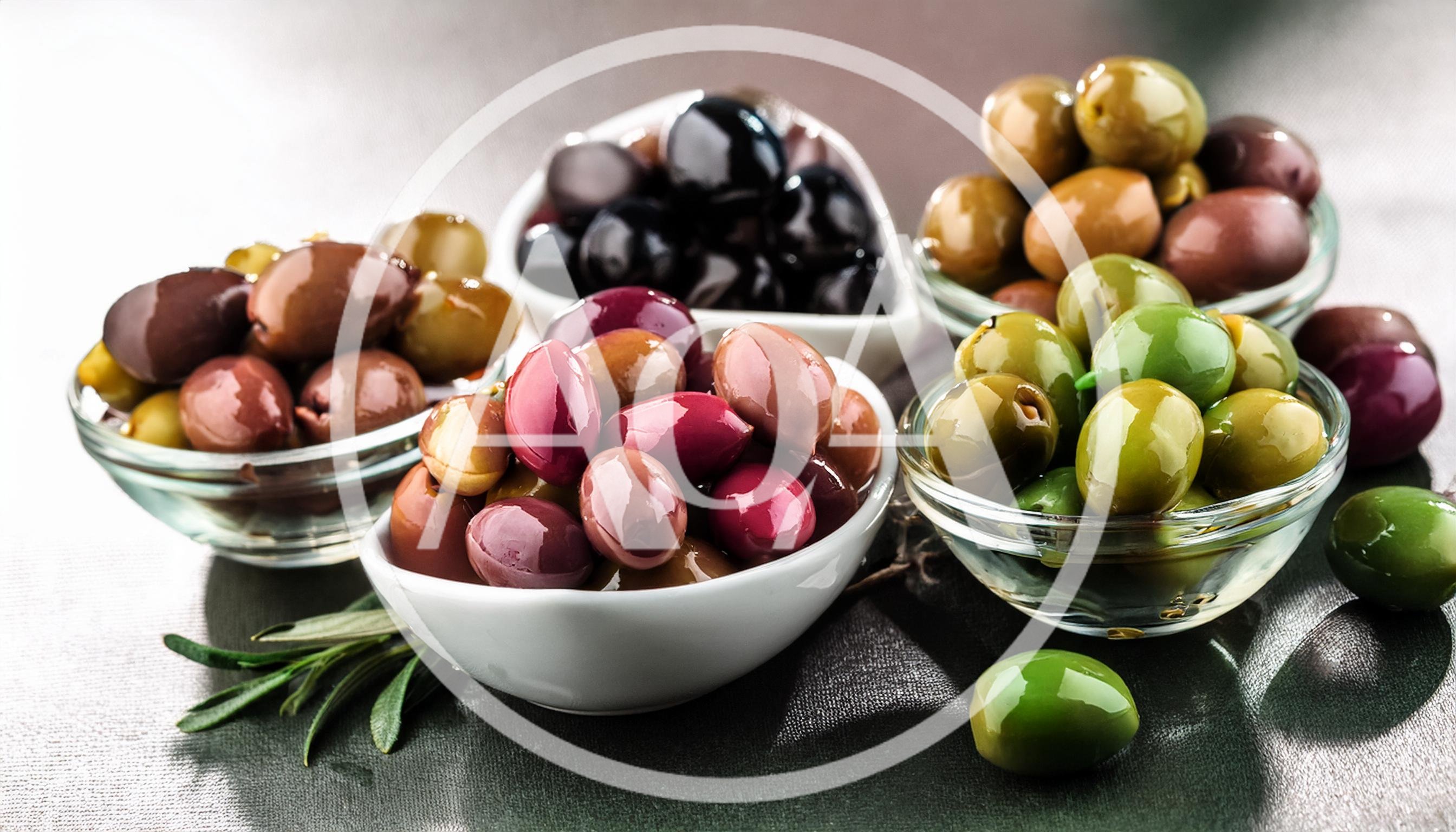 Assorted Olives in Glass and Ceramic Bowls