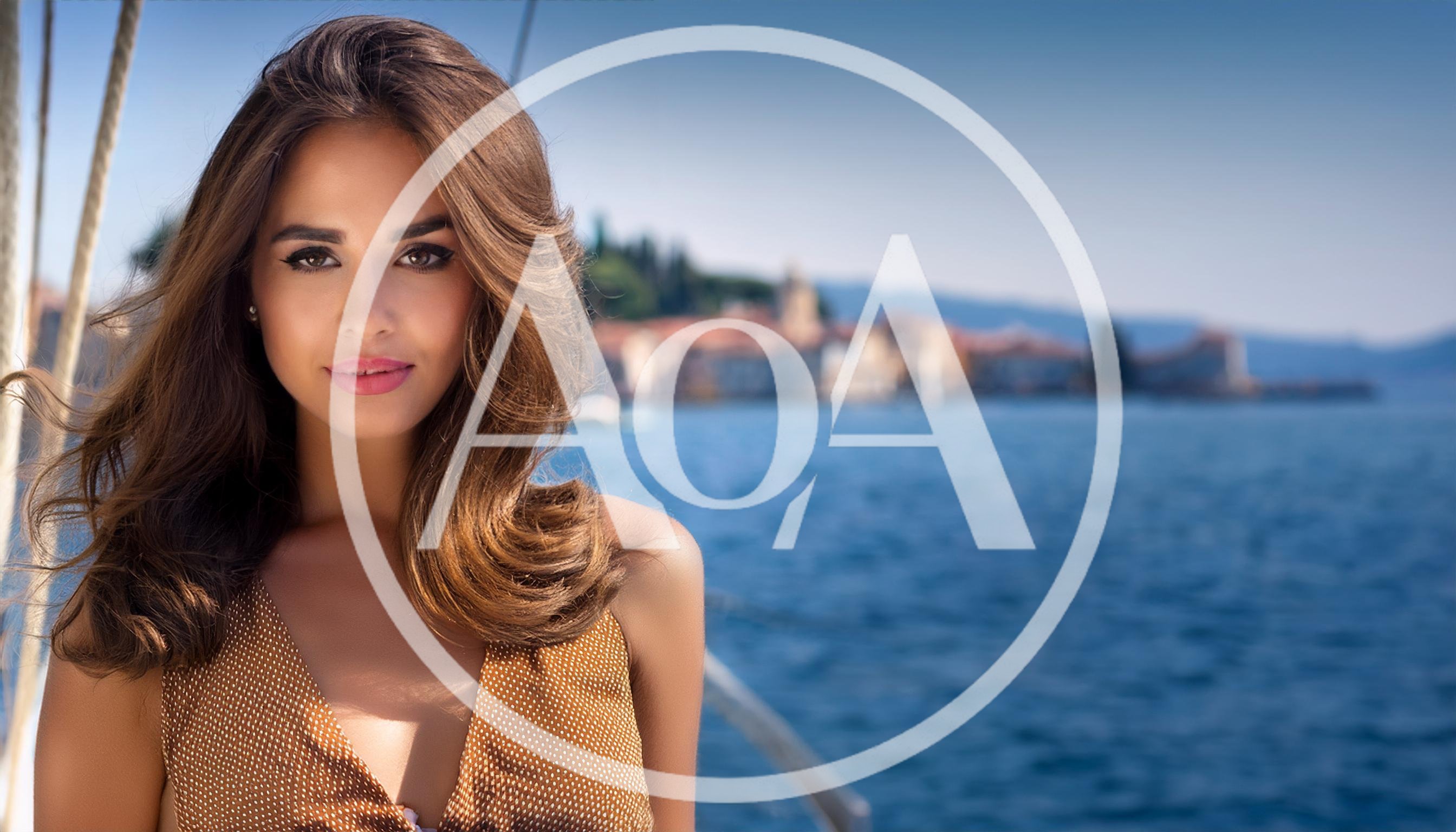 Beautiful Woman Posing On A Yacht At Sea