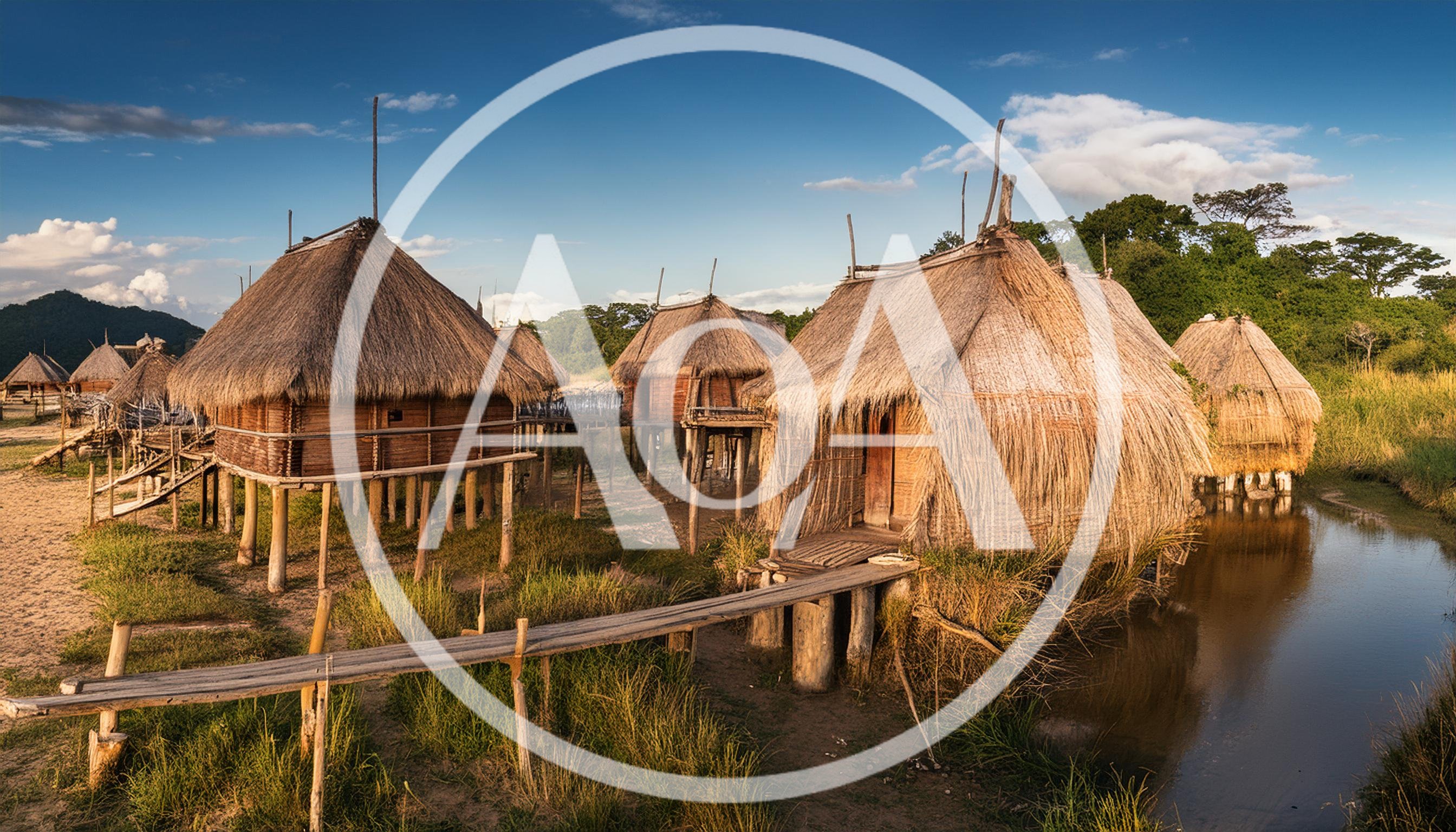 Traditional Stilt Houses In A Tropical Wetland Village