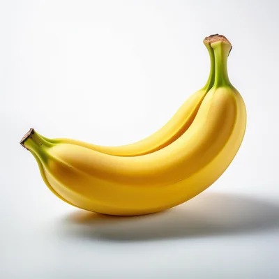 Two Fresh Yellow Bananas On White Background