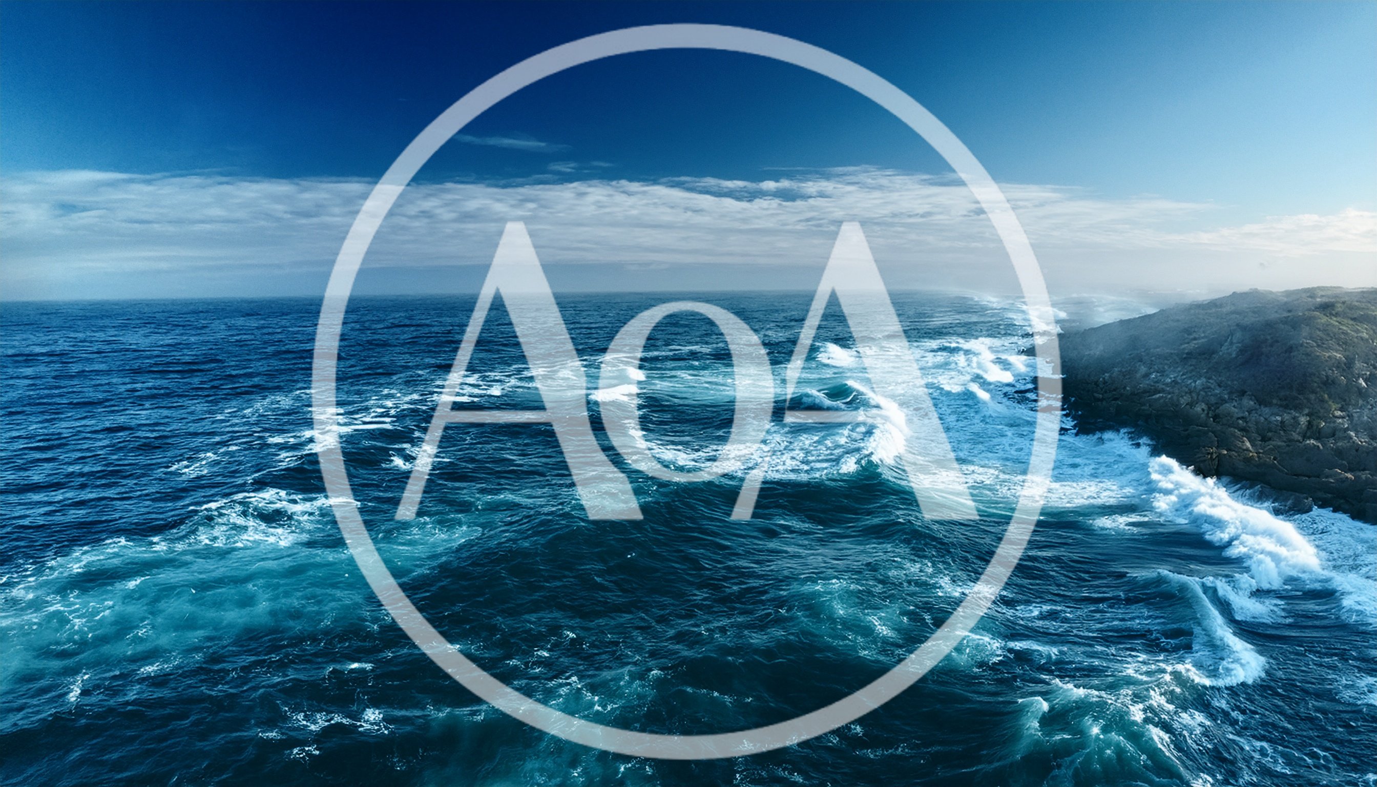 Aerial View Of Crashing Waves Against Rocky Coastline