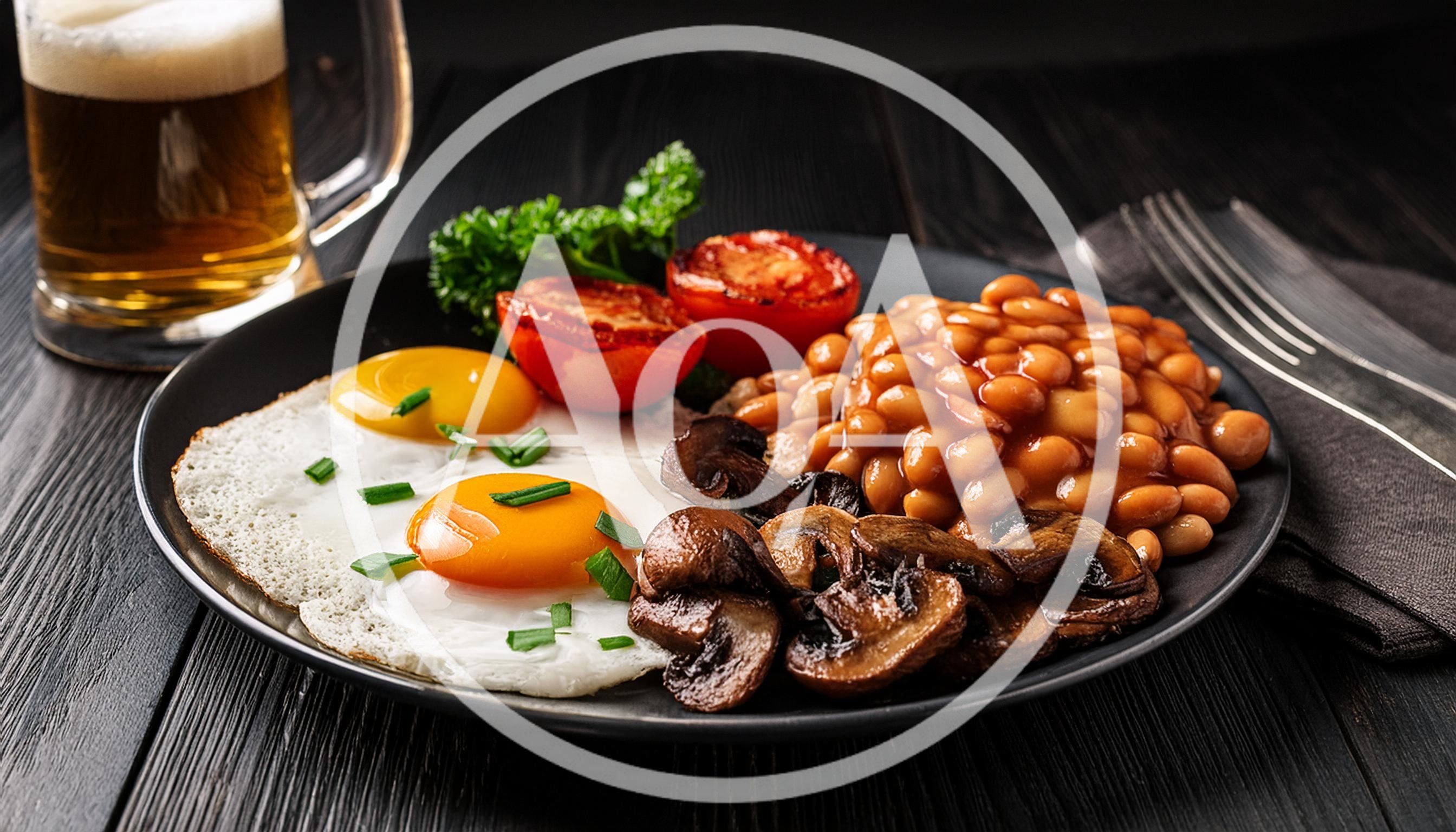 Traditional English Breakfast With Fried Eggs And Beans