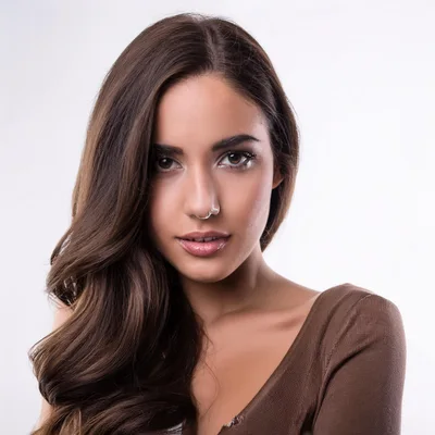 Portrait Of A Beautiful Young Woman With Long Hair