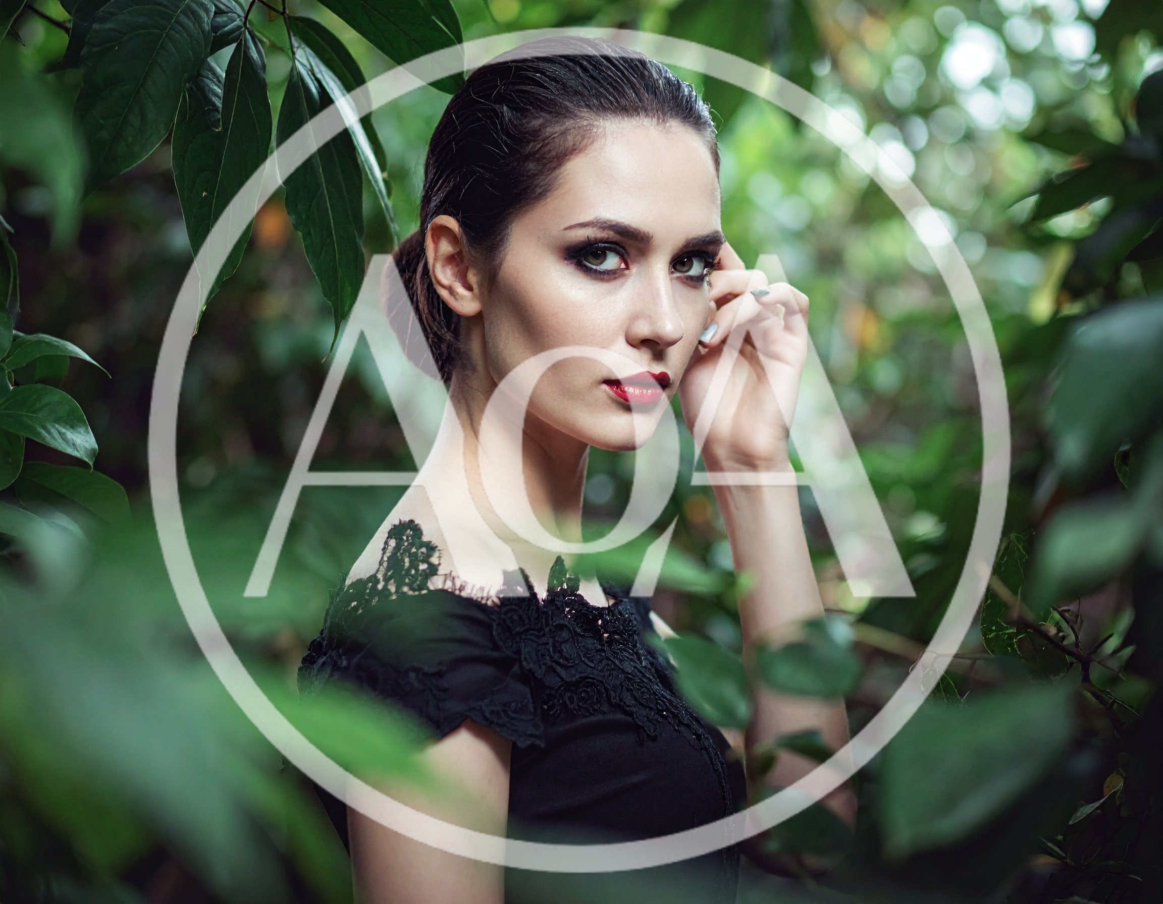 Elegant Woman Posing In Lush Green Foliage
