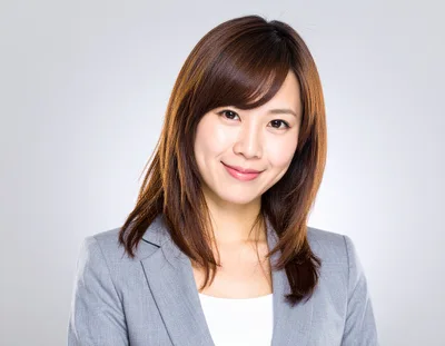 Professional Asian Businesswoman Smiling In Studio Portrait