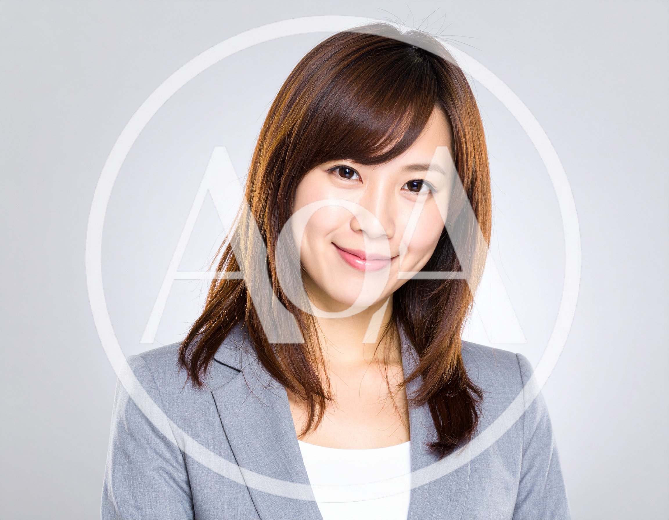 Professional Asian Businesswoman Smiling In Studio Portrait