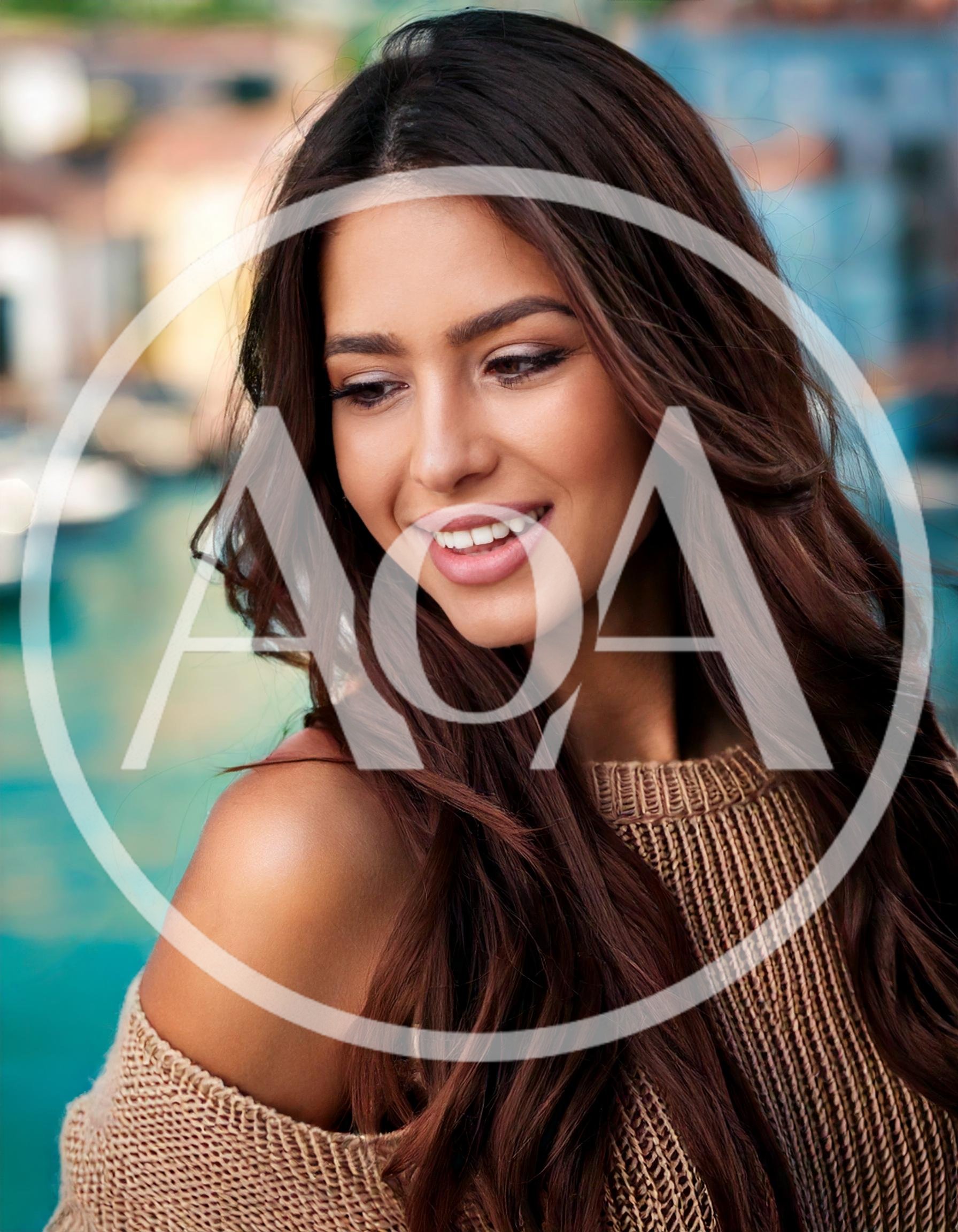 Portrait Of A Beautiful Woman Smiling Outdoors