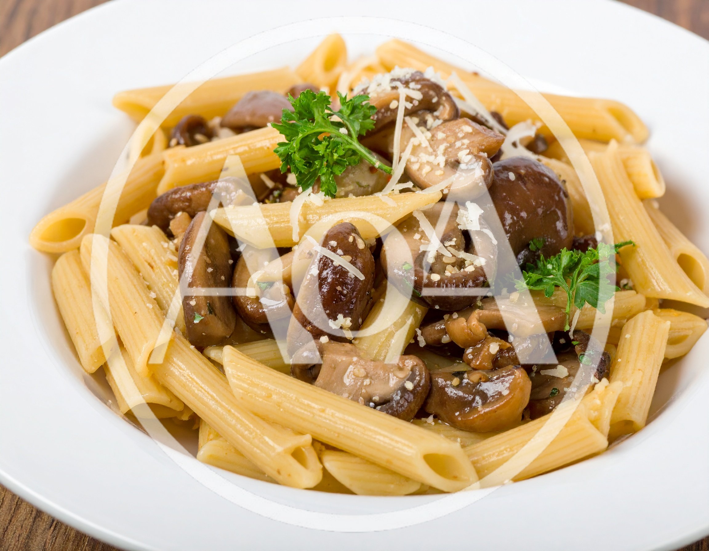 Penne Pasta With Sautéed Mushrooms And Parmesan Cheese