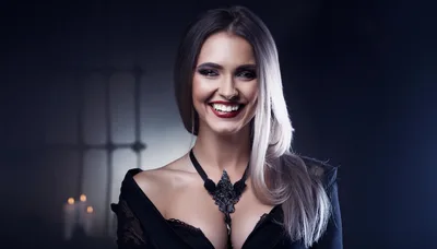 Beautiful Woman Dressed As A Vampire Smiling