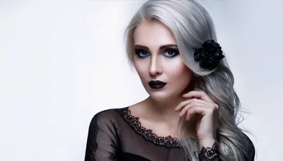 Portrait of a Woman with Platinum Blonde Hair and Dark Makeup