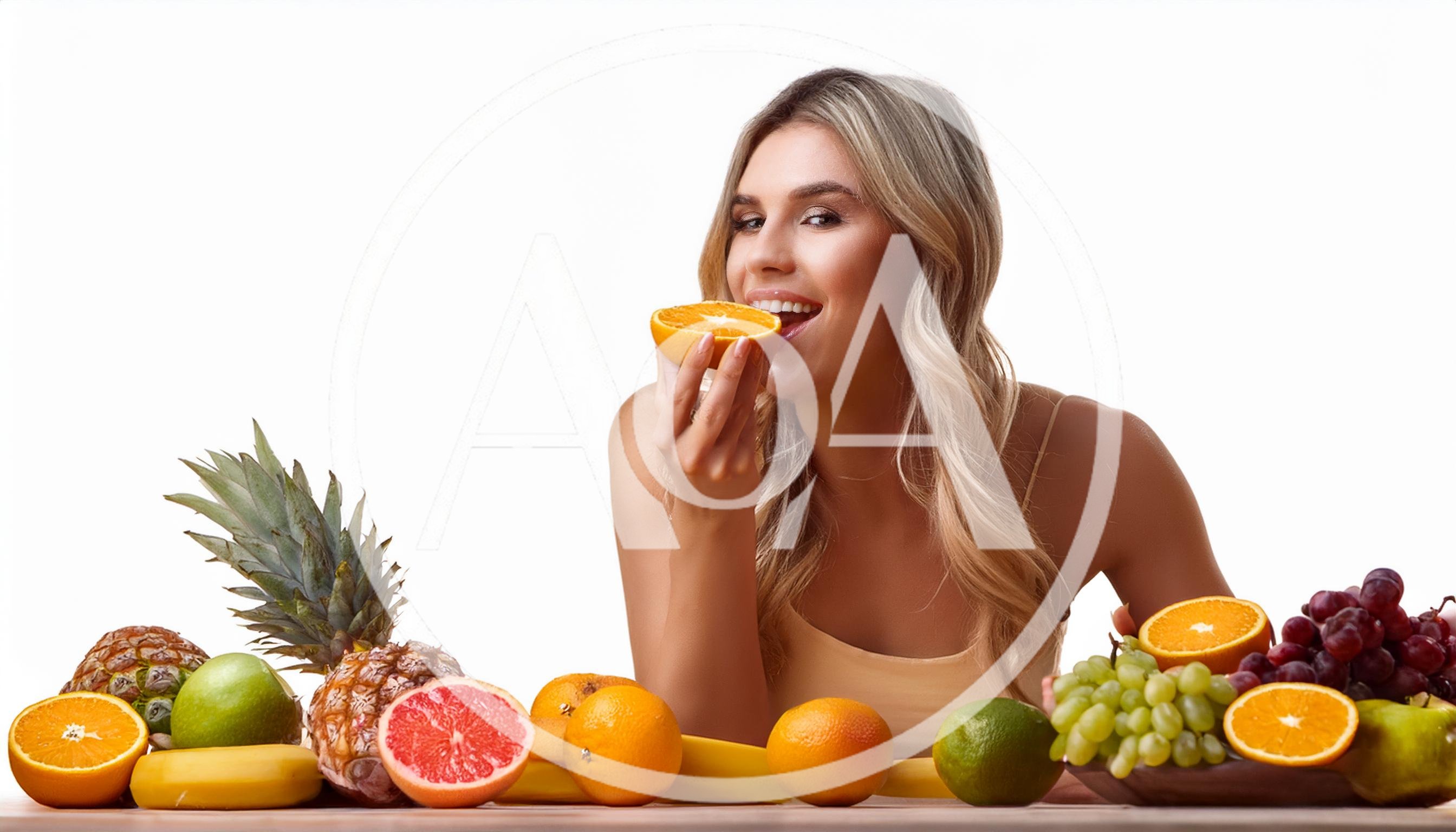 Beautiful Woman Eating Fresh Orange Slice