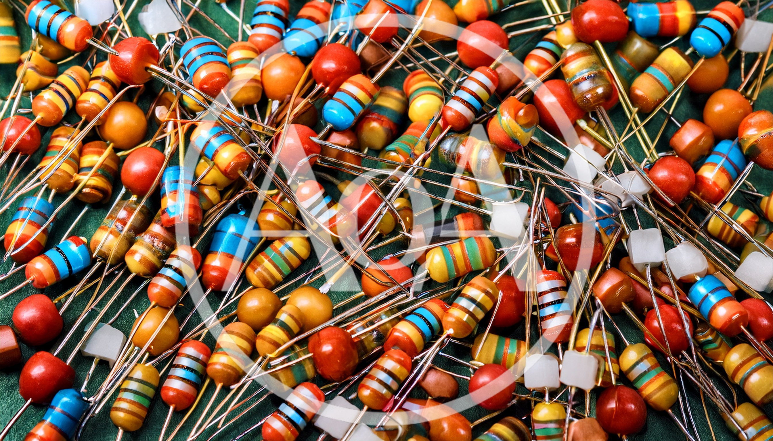 Pile Of Assorted Electronic Resistors And Capacitors