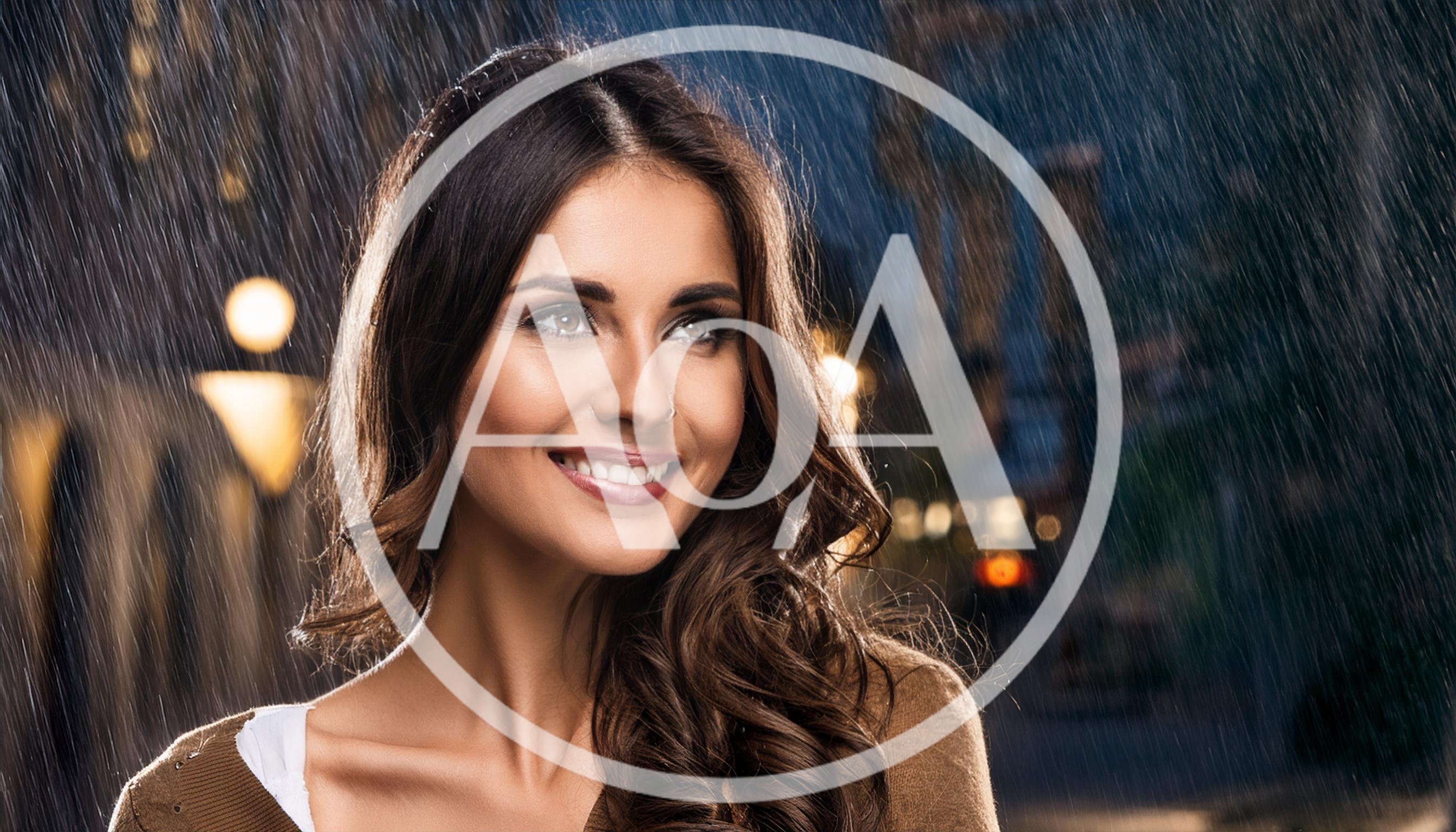 Smiling Woman Standing Outside During A Rainstorm