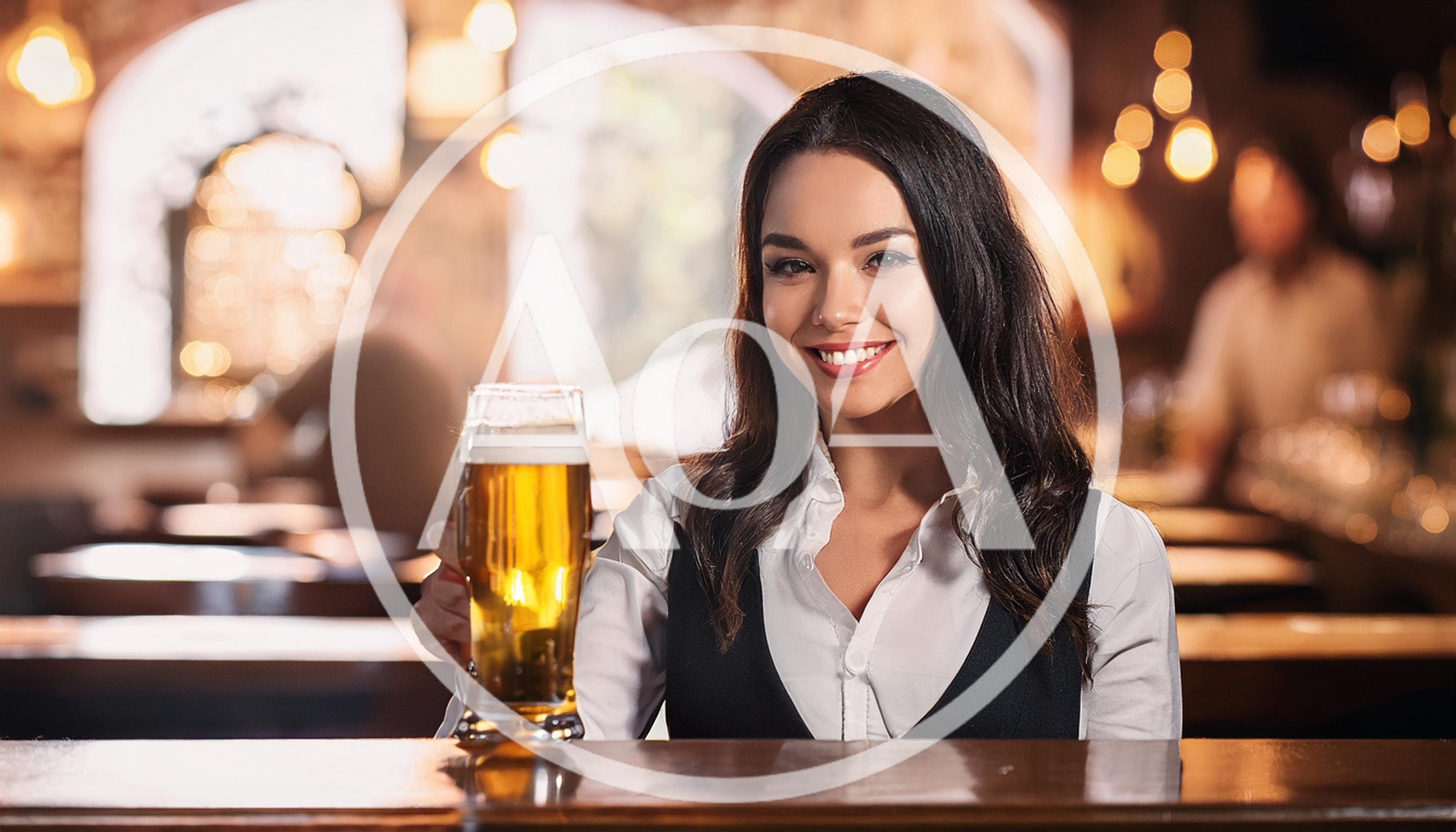 Smiling Female Bartender Serving A Glass Of Beer