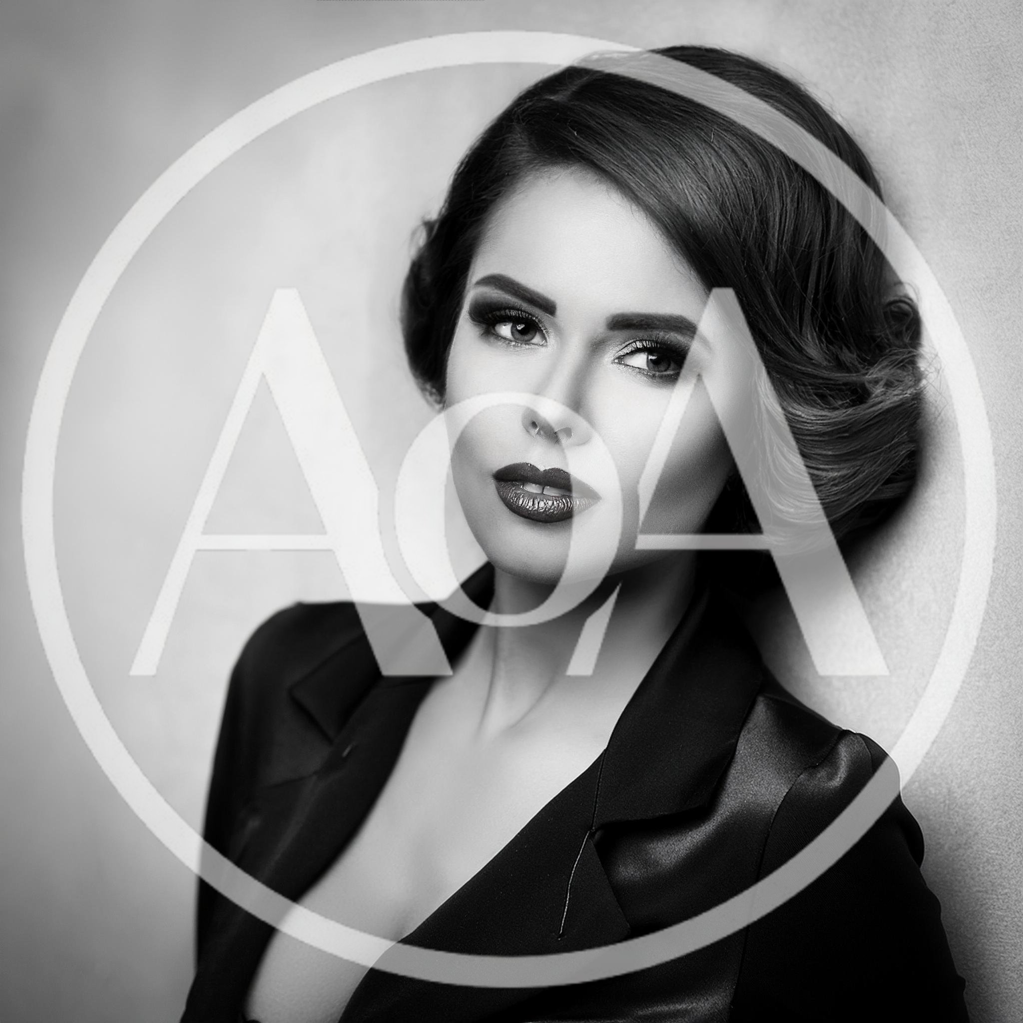 Elegant Woman With Vintage Hairstyle In Black Blazer