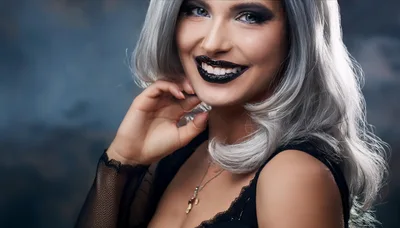 Portrait Of A Woman With Silver Hair And Black Lipstick