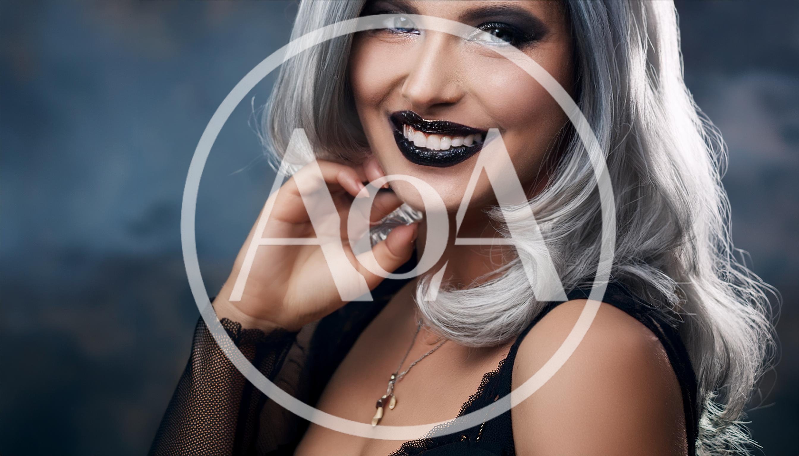 Portrait Of A Woman With Silver Hair And Black Lipstick