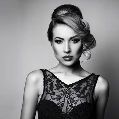 Portrait Of A Glamorous Woman In A Lace Dress