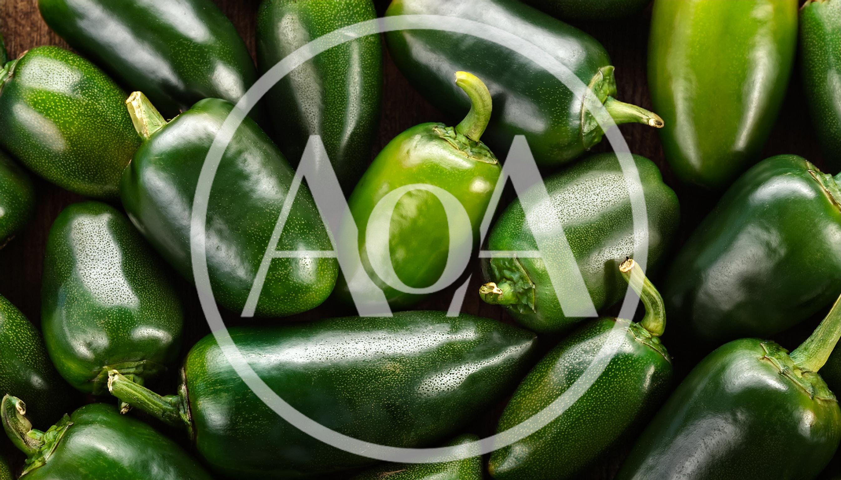 Fresh Green Jalapeno Peppers Arranged On Wooden Surface