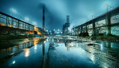 Abandoned Industrial Factory Complex At Night In Rain