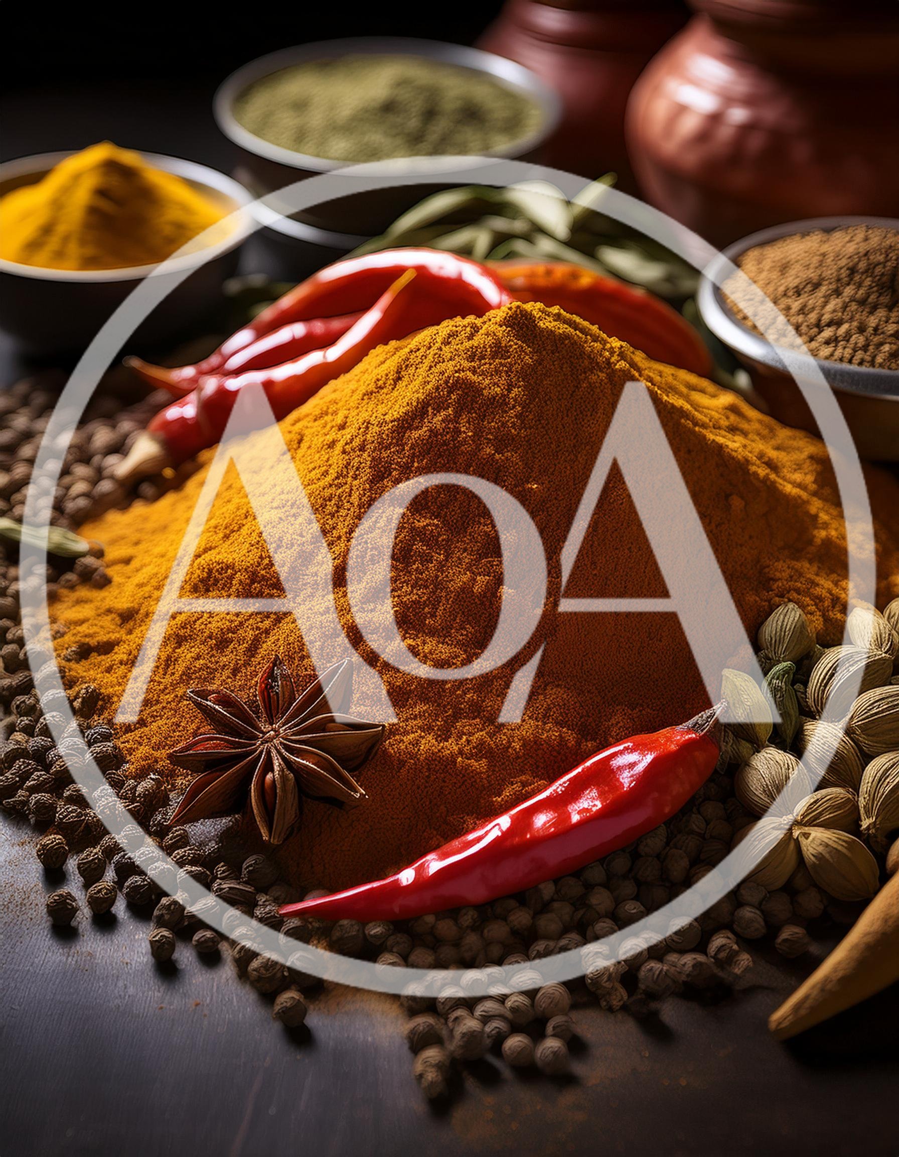 Heap of Turmeric Powder Surrounded by Assorted Spices