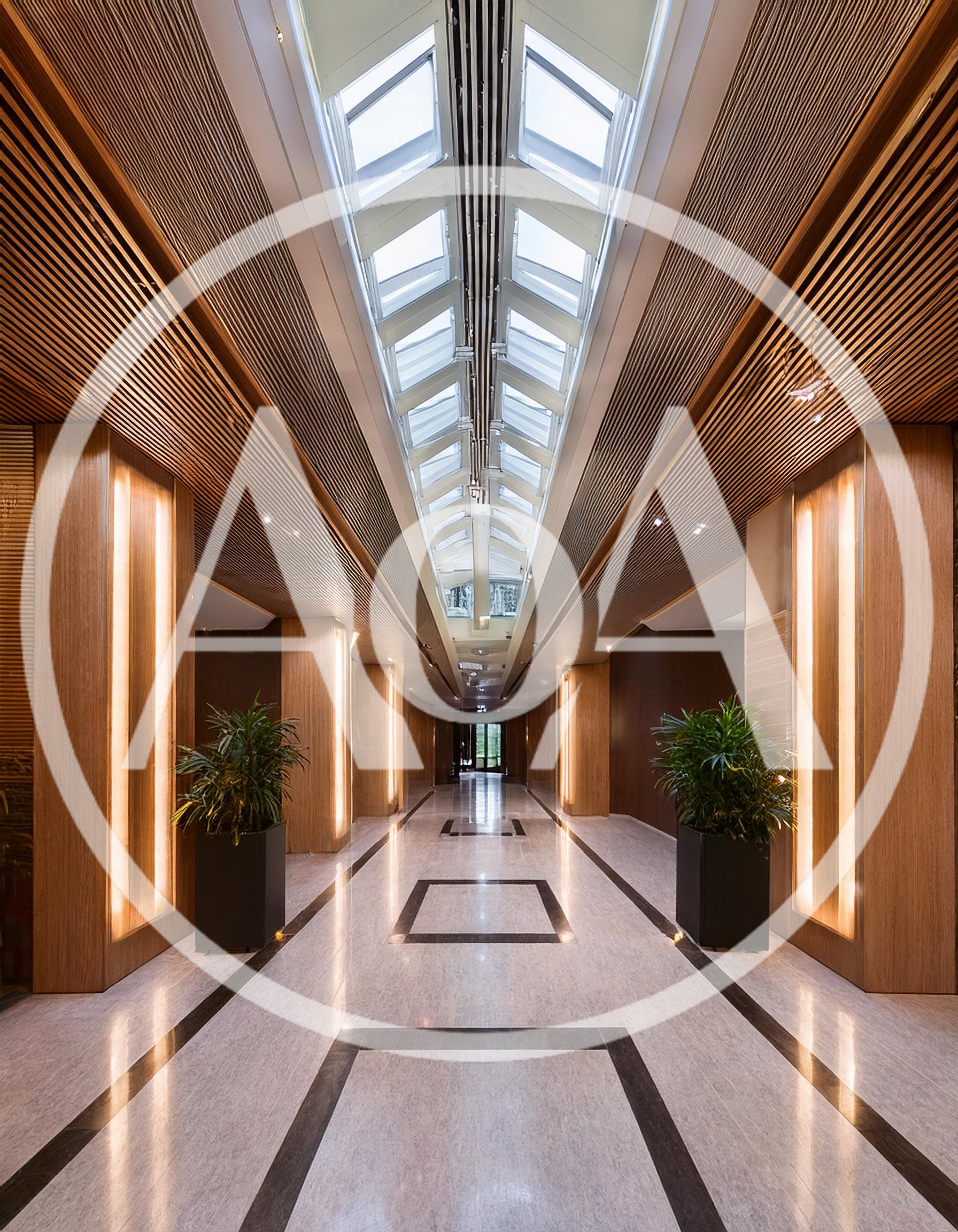 Modern Hallway With Skylight And Wooden Slatted Ceiling