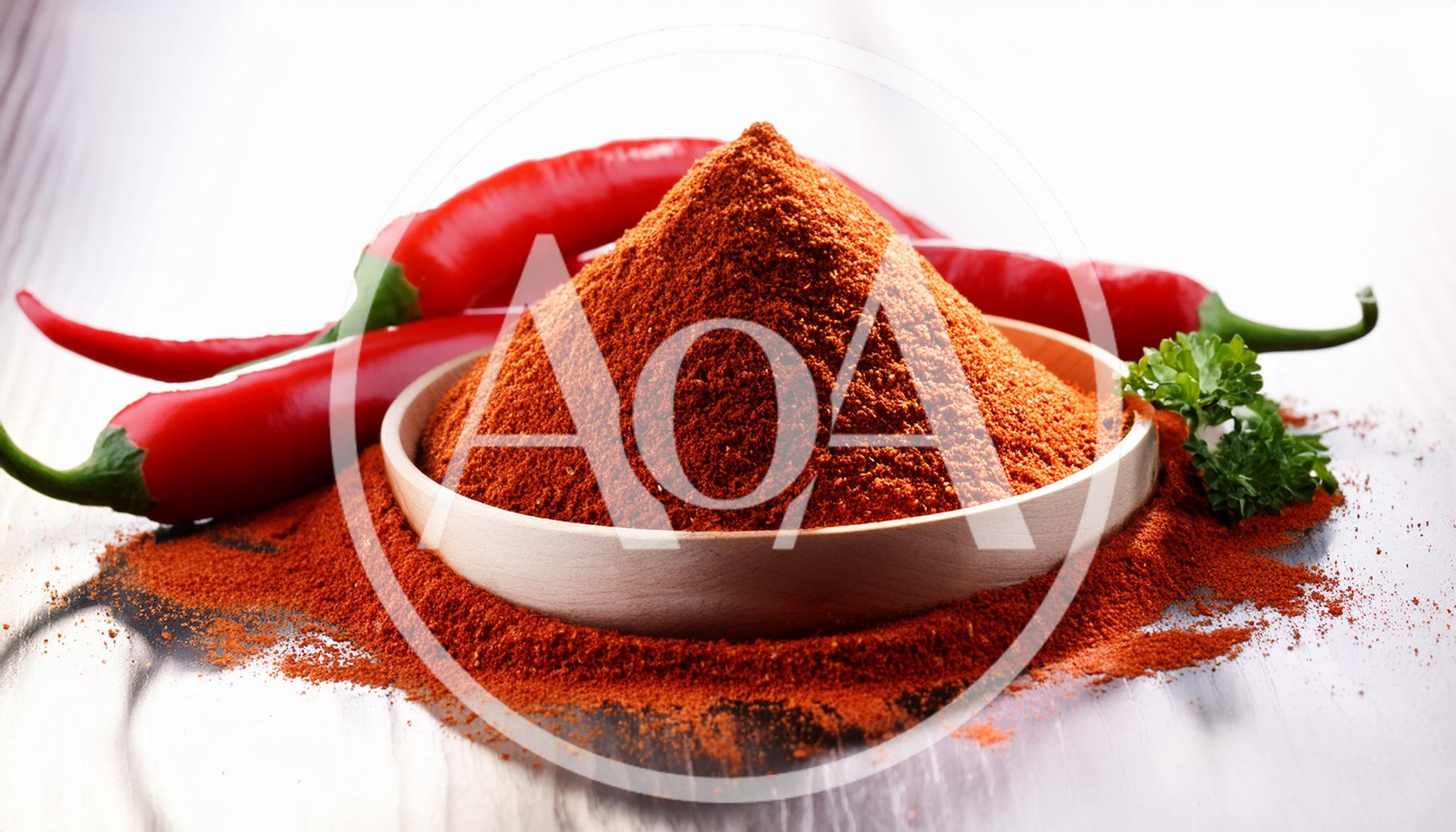 Wooden Bowl Filled With Ground Red Chili Pepper Powder