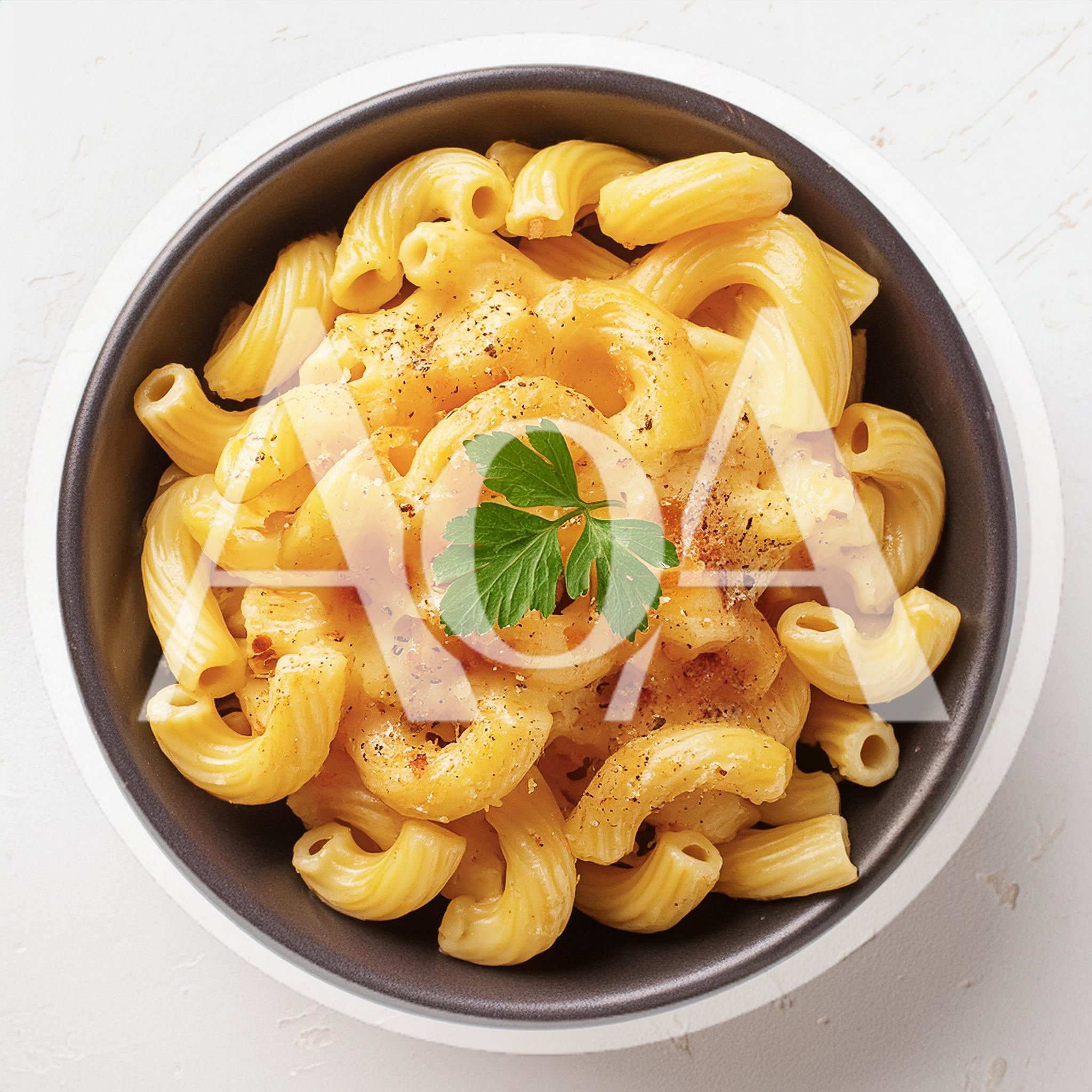 Bowl Of Creamy Macaroni And Cheese With Parsley