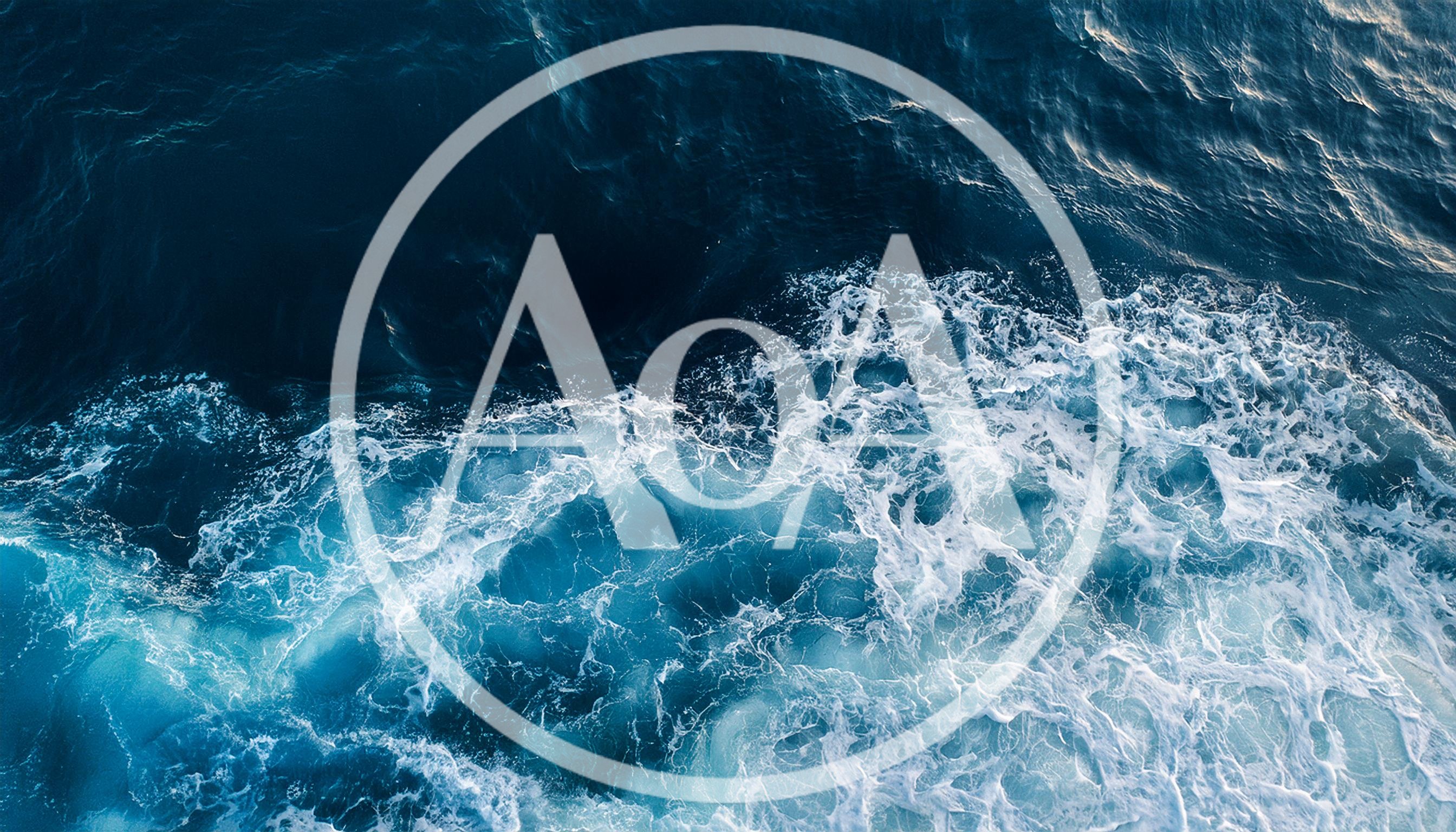 Aerial View Of Ocean Waves And White Sea Foam
