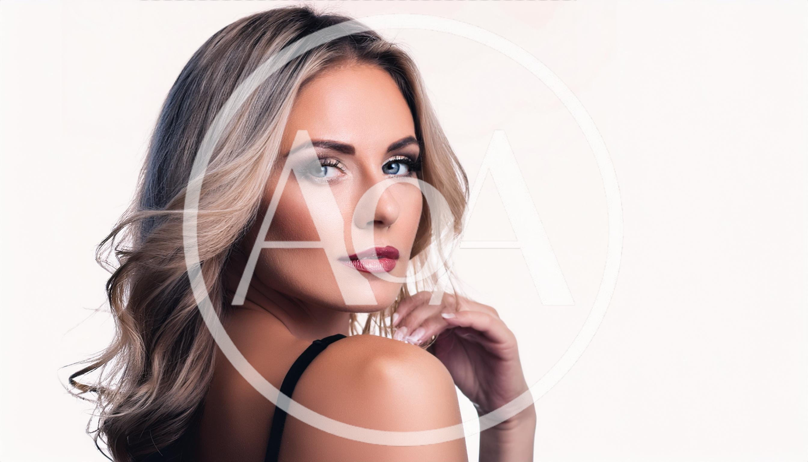 Portrait Of A Beautiful Blonde Woman Looking Back